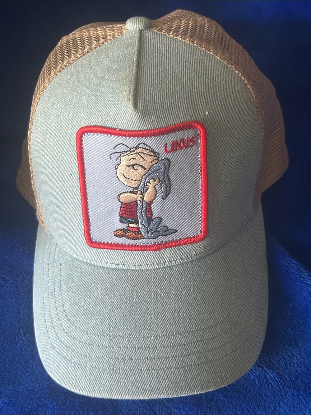 Peter Grimm Light  Trucker Hat featuring a Linus “Peanuts”Patch!
